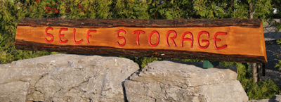 Rustic Self Storage entrance sign